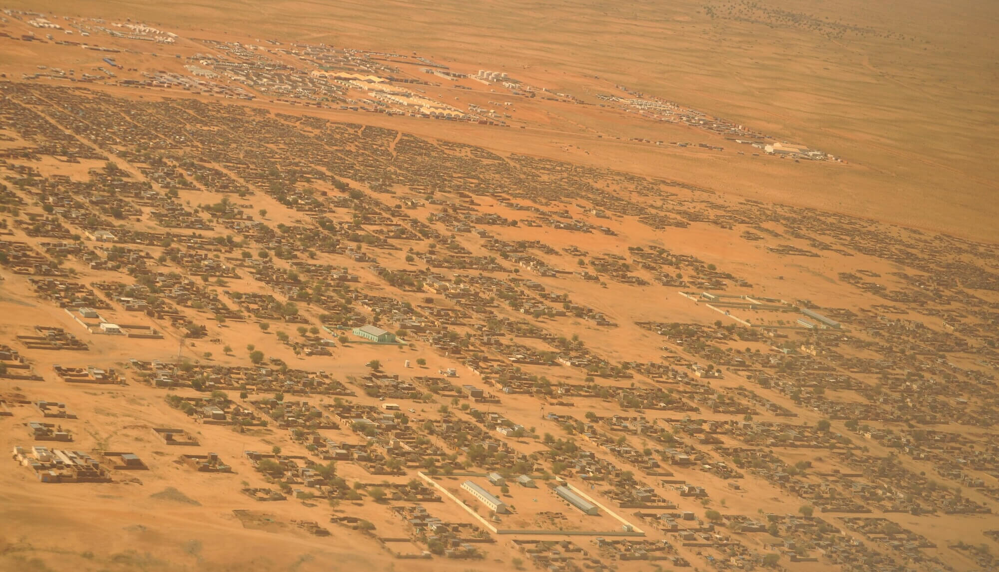 Imagen aérea tomada en 2009 de El Fasher, Sudán, uno de los principales epicentros de la guerra civil que asola el país desde 2023.